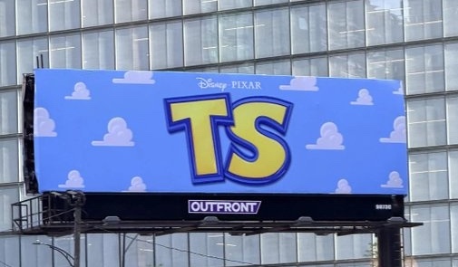 Swifties Think This New Billboard Could Be Connected To ‘Toy Story 5’